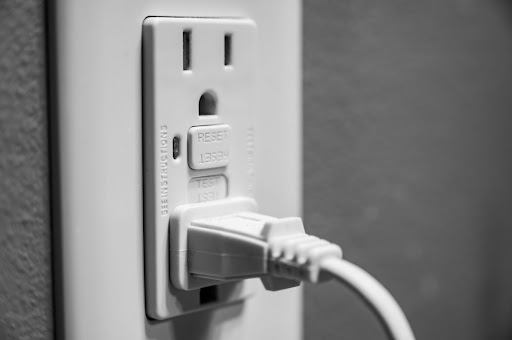 A GFCI outlet and a plug.