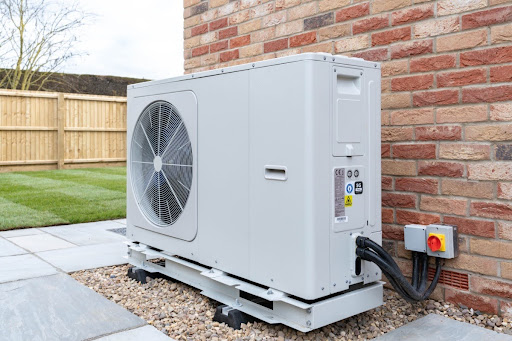 A heat pump unit installed outdoors.